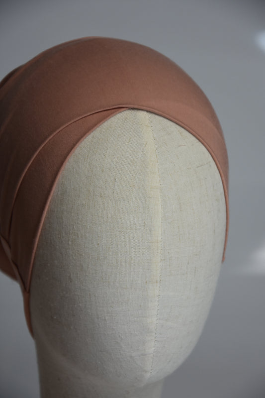 Bonnet wendbar almond nude