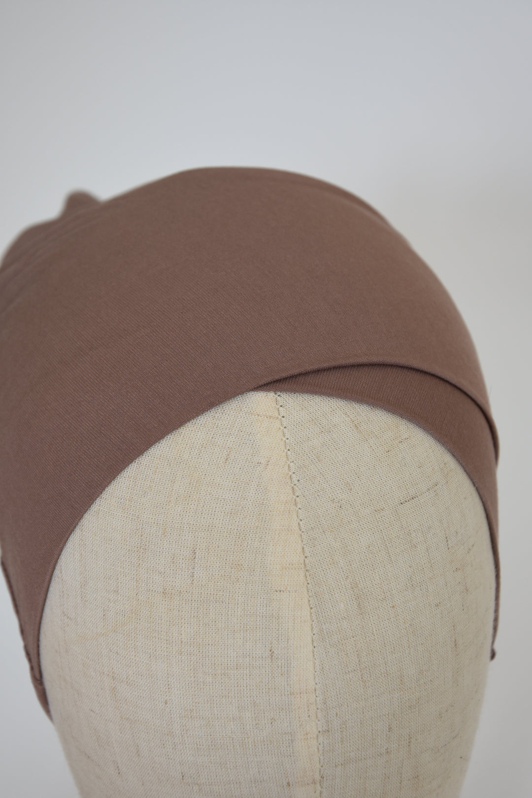 Bonnet wendbar taupe