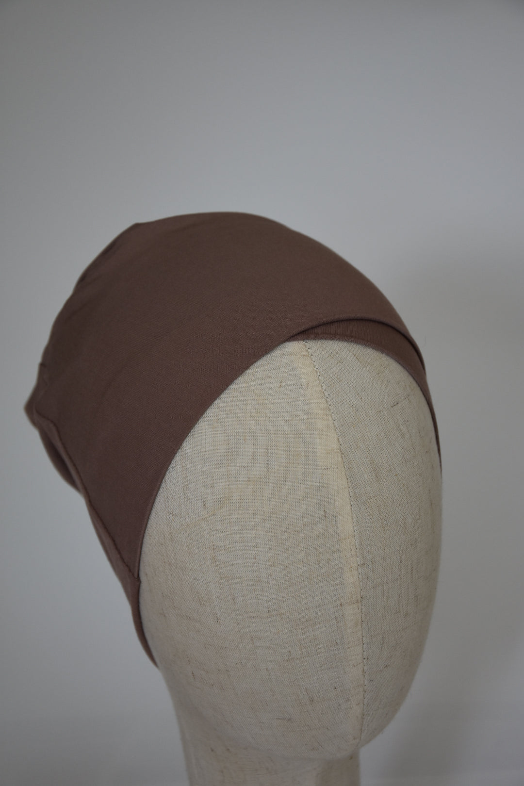 Bonnet wendbar taupe